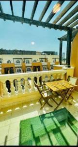 Bright clean room with balcony and bathroom