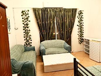 Amazingly Large Furnished Room with Bath, Balcony, Utilities for Muslim Working Lady Only! AED1500/-